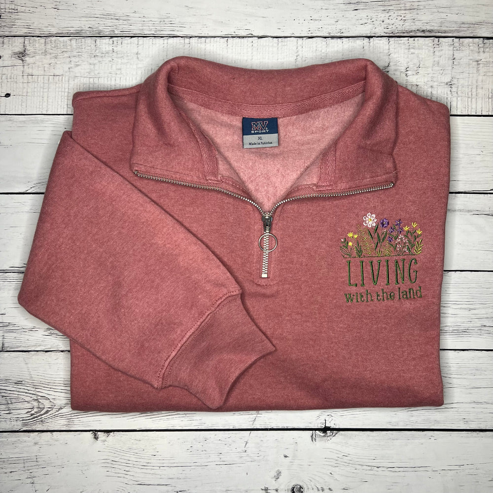 
                      
                        The Land Women's Quarter Zip
                      
                    