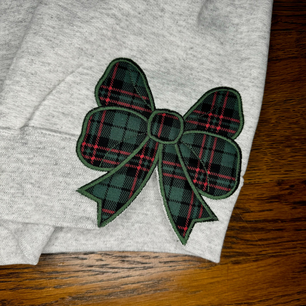 
                      
                        Merry Side Bows Crewneck
                      
                    