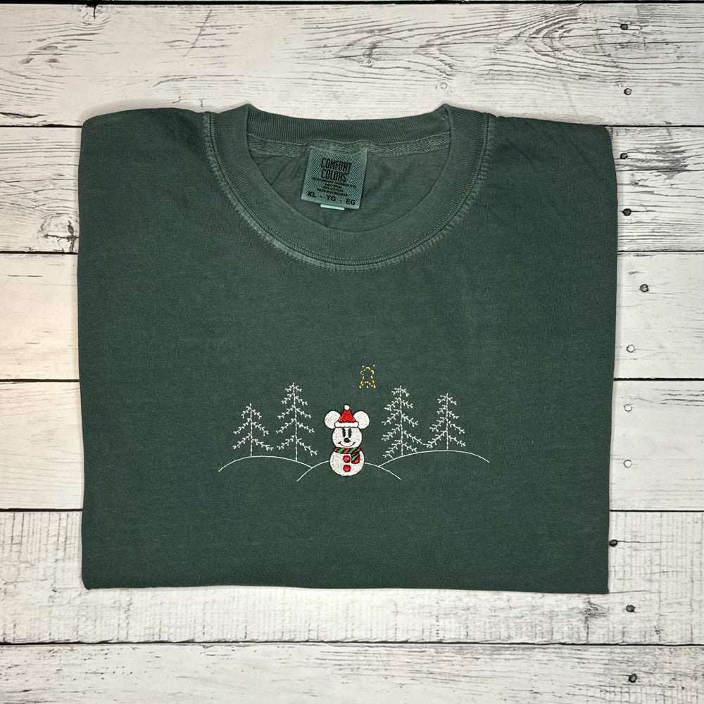 
                      
                        Snowman in the Forest Tee
                      
                    